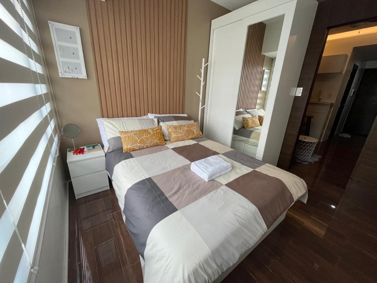 Homey 1 Bedroom Unit At Air Residences マカティ エクステリア 写真